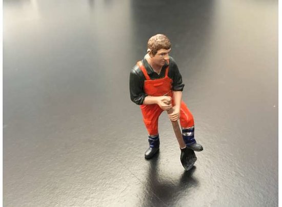 Figure - Roland Spading.Orange safety jacket with helmet