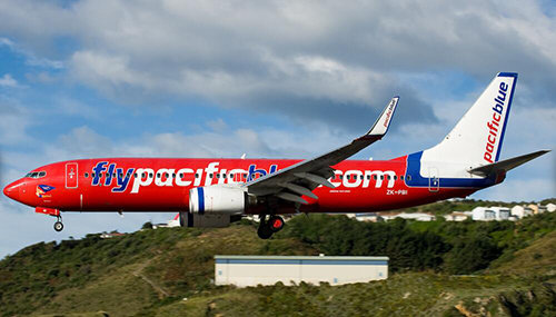 Boeing 737-800 Pacific Blue Airlines with stand