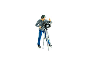 Figure of Cameraman with a camera on tripod