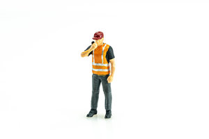 Figur eines Arbeiters mit einem Sender