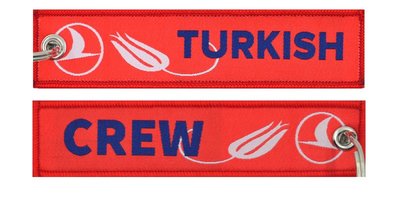 Keyholder with Turkish on one side and (Turkish) crew on other side