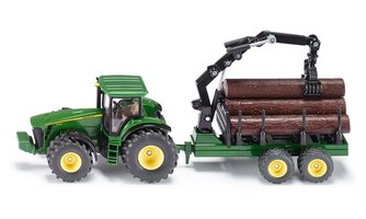 John Deere 8430 traktor s vlečkou na drevo a ramenom