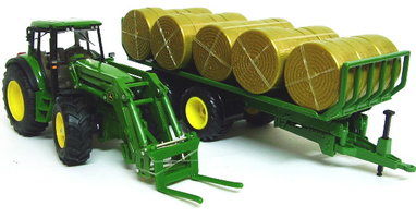 JohnDeere 6920 Zugmaschine und Anhänger mit Ballen